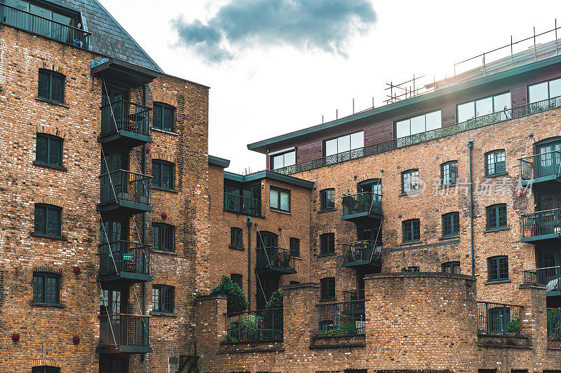 Brick building with windows, background